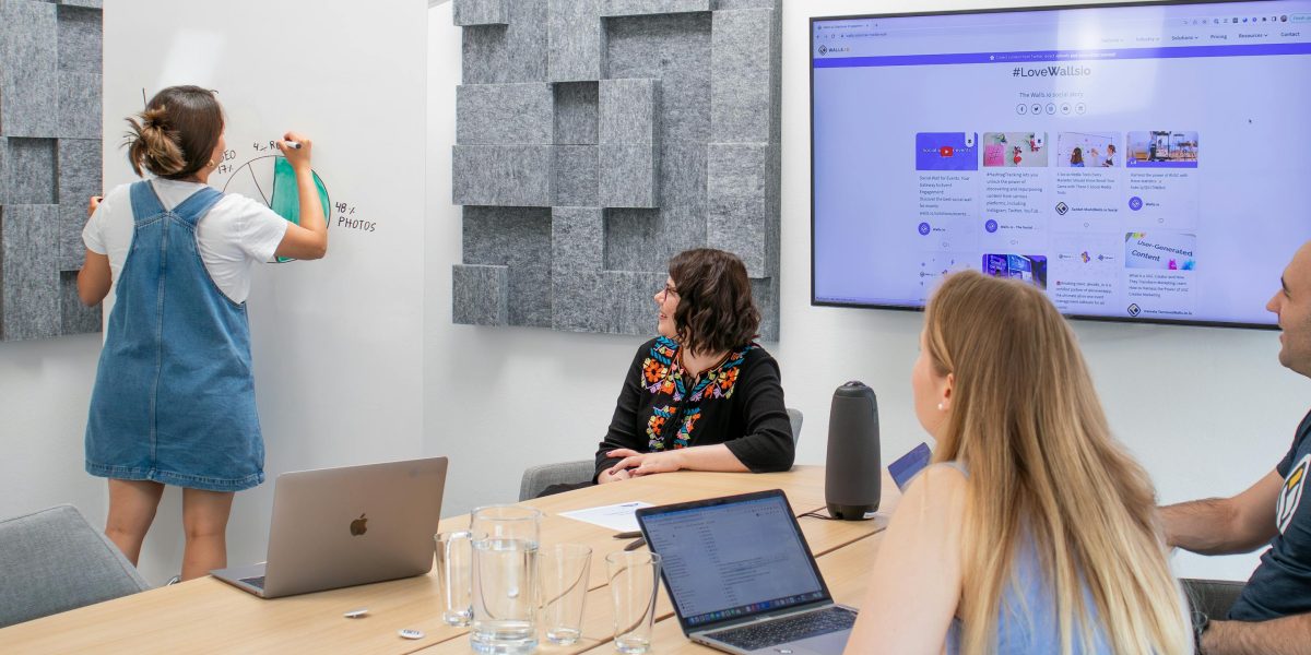 Depicting a team working together effectively, leveraging tools to manage content pipelines.