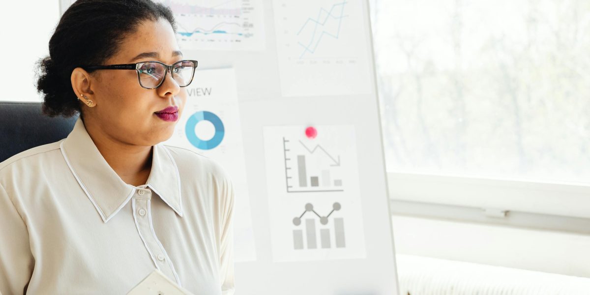 A professional analyzing data to make an informed decision, representing the choice of the best AI tools.