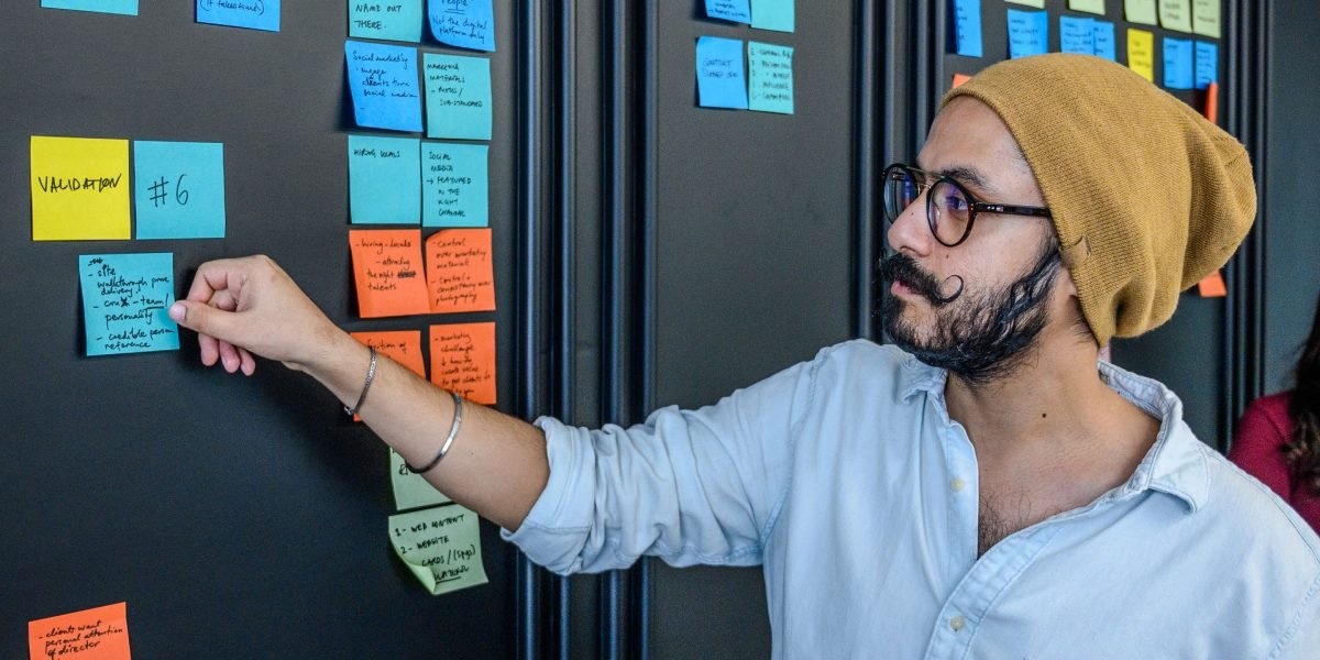 A project manager efficiently organizing tasks and resources, reflecting a streamlined editorial workflow.