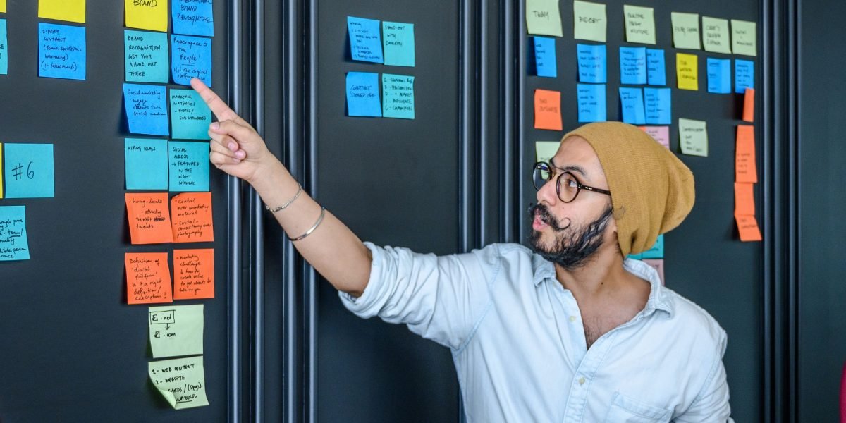 A designer brainstorming creative ideas, perhaps leveraging AI tools to visualize concepts quickly.
