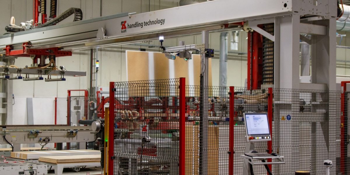 Robotic systems efficiently manage tasks in a contemporary factory or logistics center, showcasing automation.