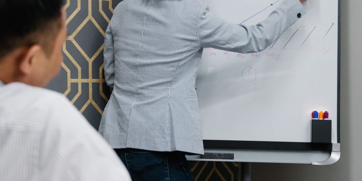 A team collaborates to define clear requirements, crucial for successful AI deployment.
