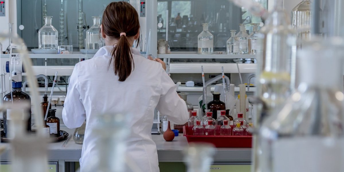 Researchers and scientists expressing joy and accomplishment after a significant breakthrough.