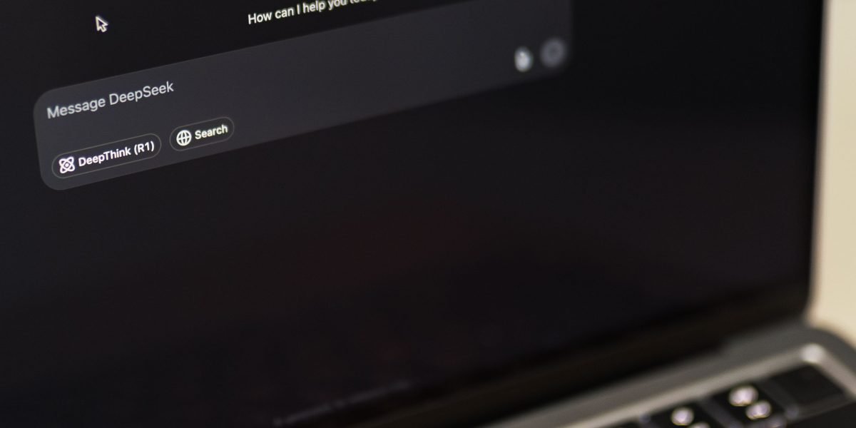 A professional actively working alongside an AI assistant, showcasing the unified workflow of code and text generation.