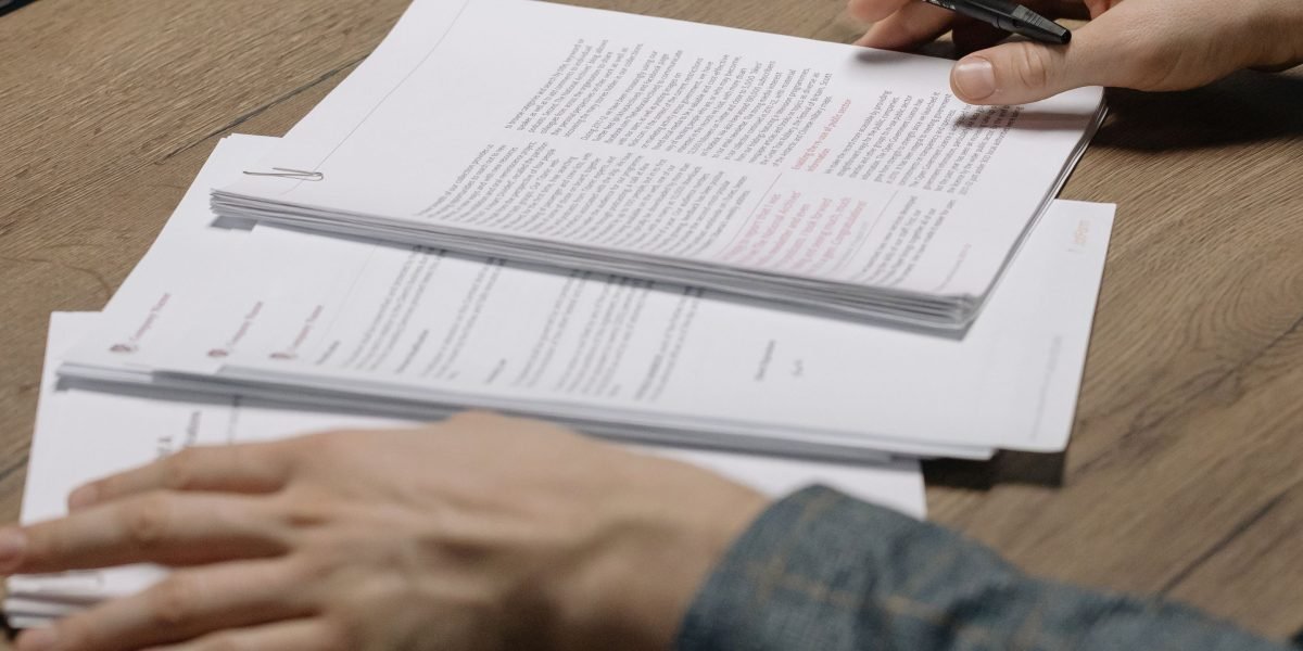 A person carefully examining security reports, emphasizing the critical need for vigilance in AI-generated code.