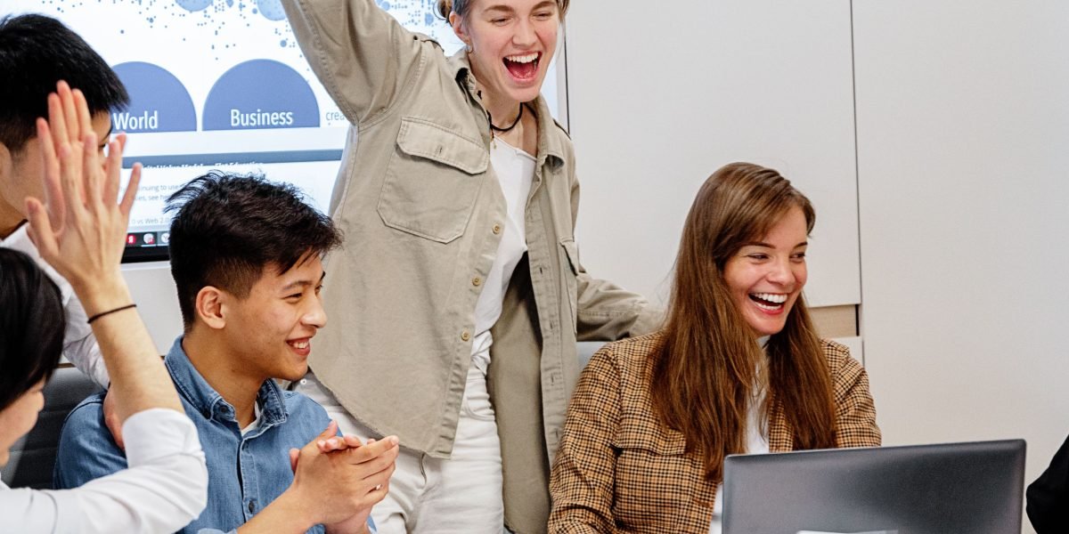 Successful teams celebrate achievements made possible by innovative AI solutions.