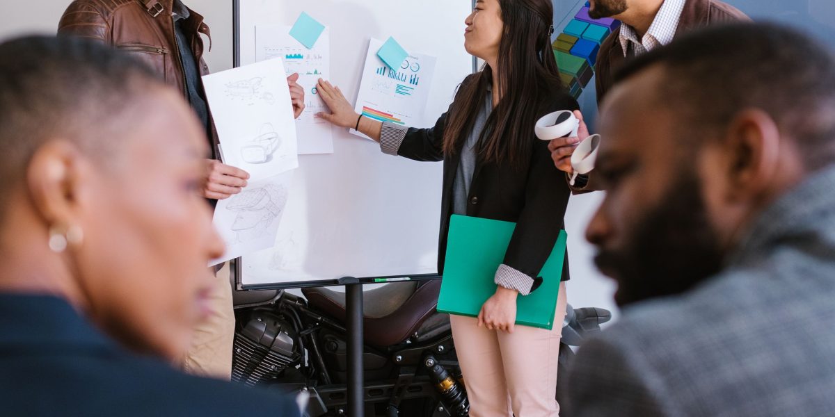 A diverse group collaborating to ensure technology is designed with varied perspectives and needs in mind.