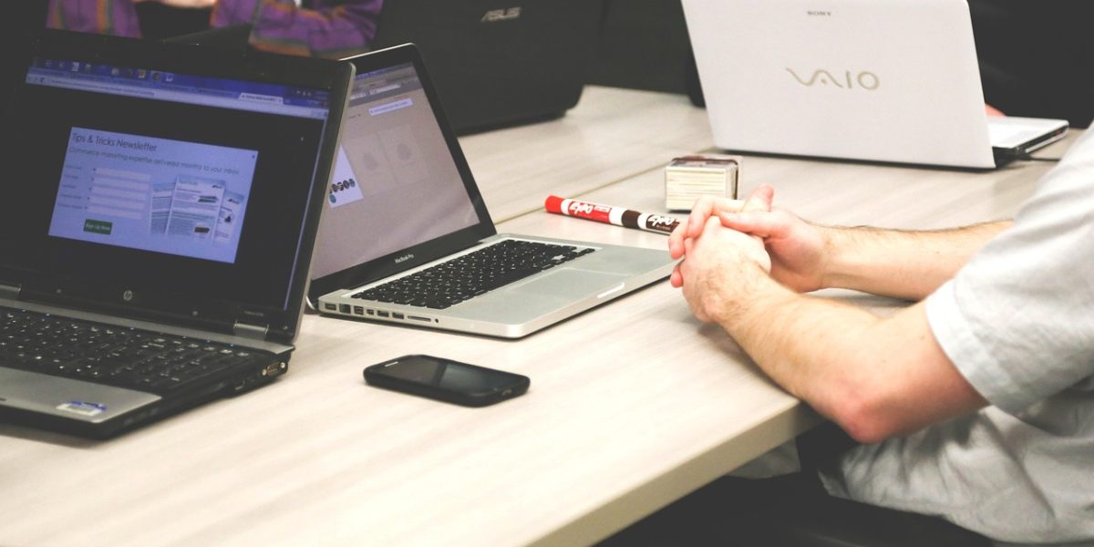 A sales professional confidently engaging in a virtual meeting, potentially using an invisible AI assistant for real-time support.
