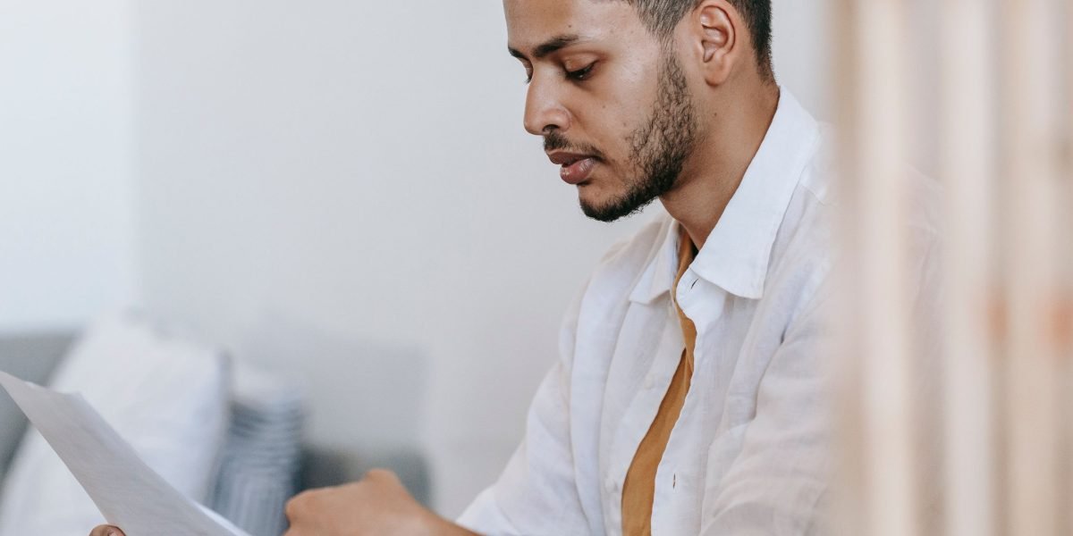 A person intently reviewing information, symbolizing the challenge of making sense of vast data in the tech world.